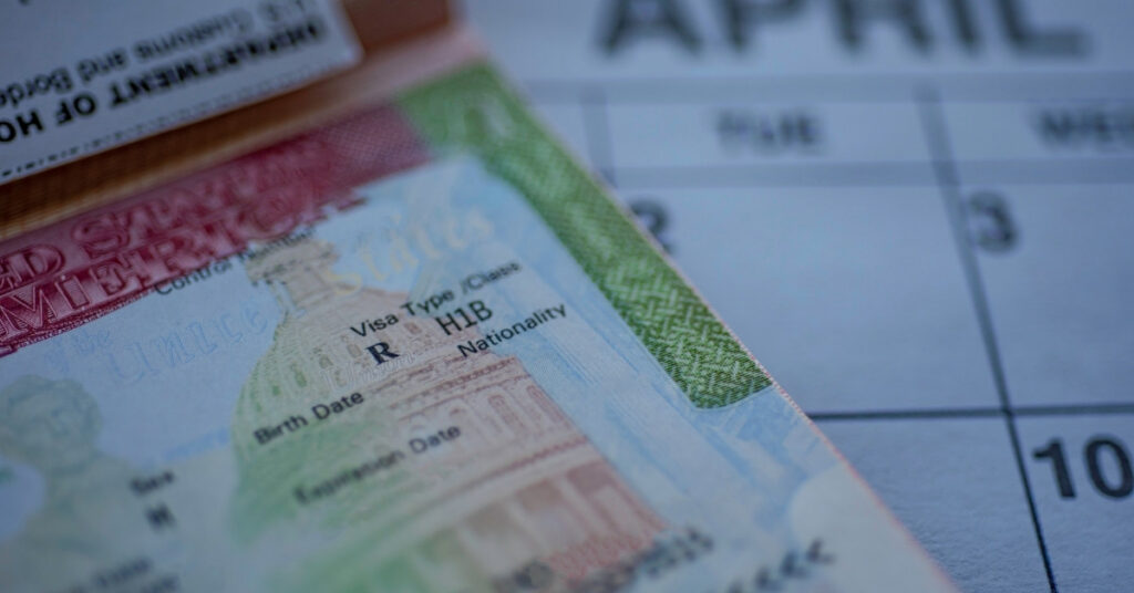 Close-up of visa and calendar used to plan application dates for an indonesia short course visa for student exchange