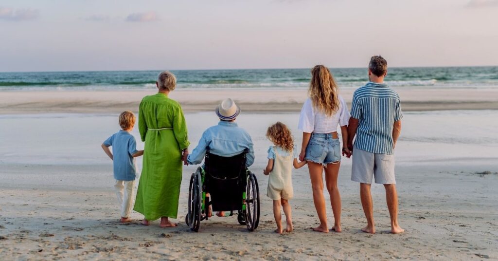 Multi-generational family on beach—Indonesia stay over 30–60 days and visa options.