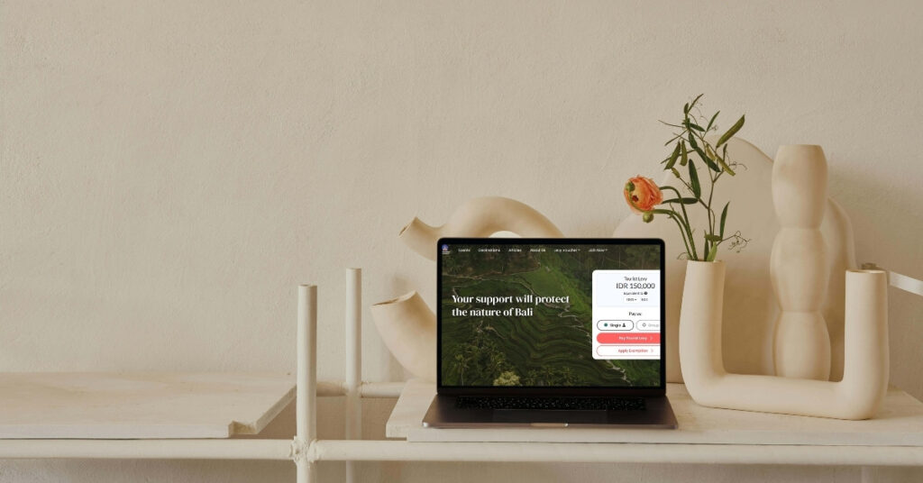 Laptop showing the official Love Bali tourist levy payment page, illustrating pre-paying the IDR 150,000 levy before entering Bali.