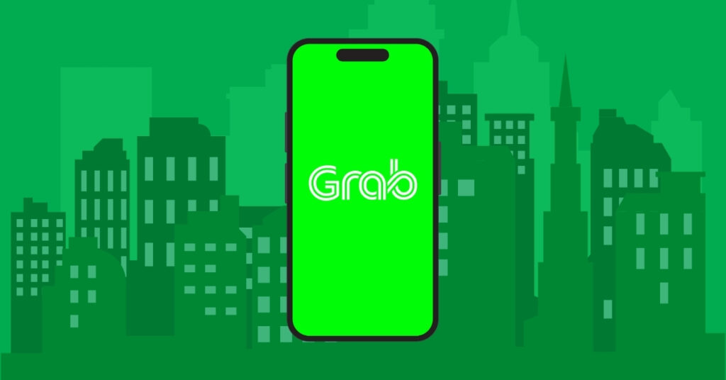 Layar smartphone yang menampilkan aplikasi Grab dengan latar belakang hijau cerah dan ilustrasi lanskap kota.