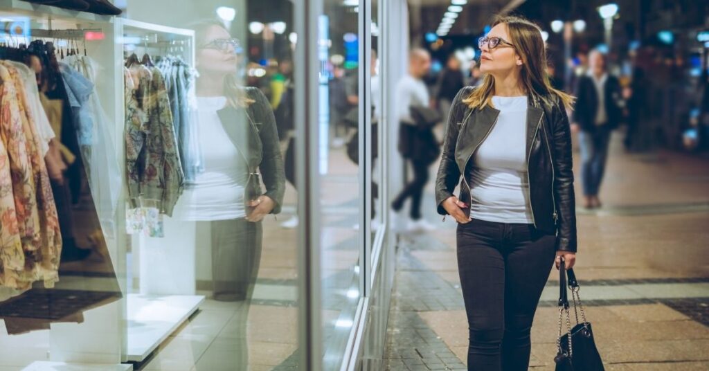 Woman window-shopping in an Indonesian mall at night—illustrating Jakarta’s big-city retail and nightlife in a Jakarta or Bali guide