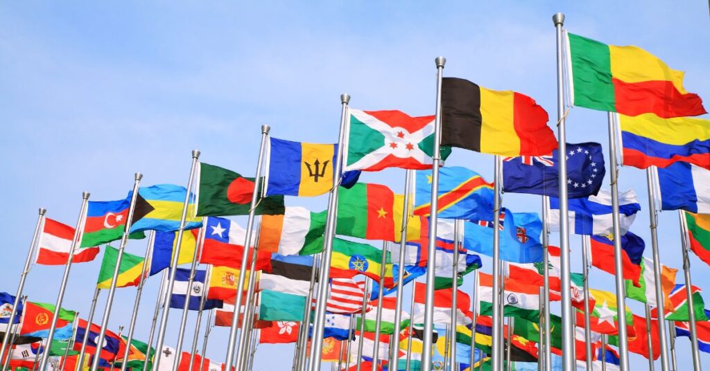 Eligible countries for Indonesia visa on arrival (VOA)—row of national flags.