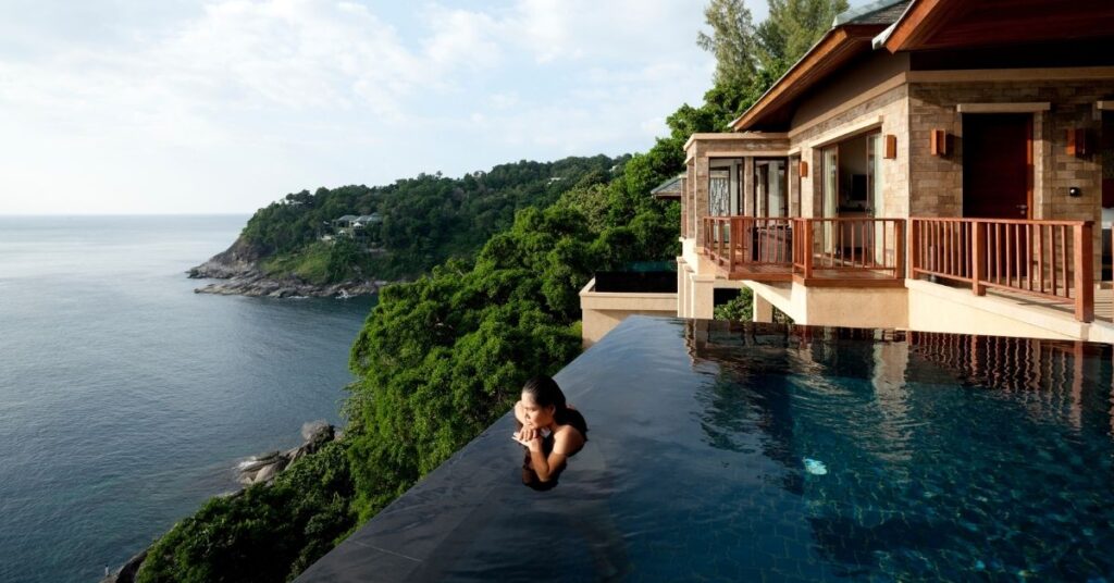 Luxury cliffside villa with infinity pool overlooking the ocean in Bali showcasing resort stays for readers choosing Jakarta or Bali